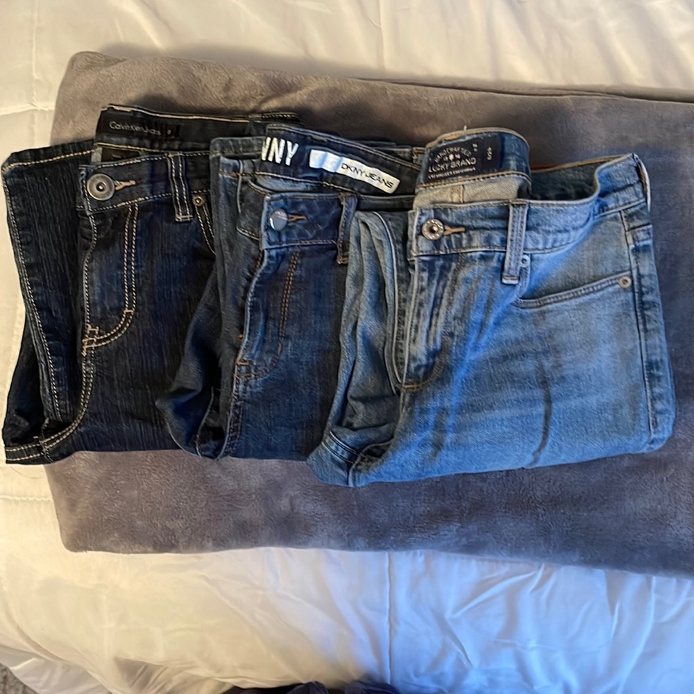 Three pairs of designer jeans